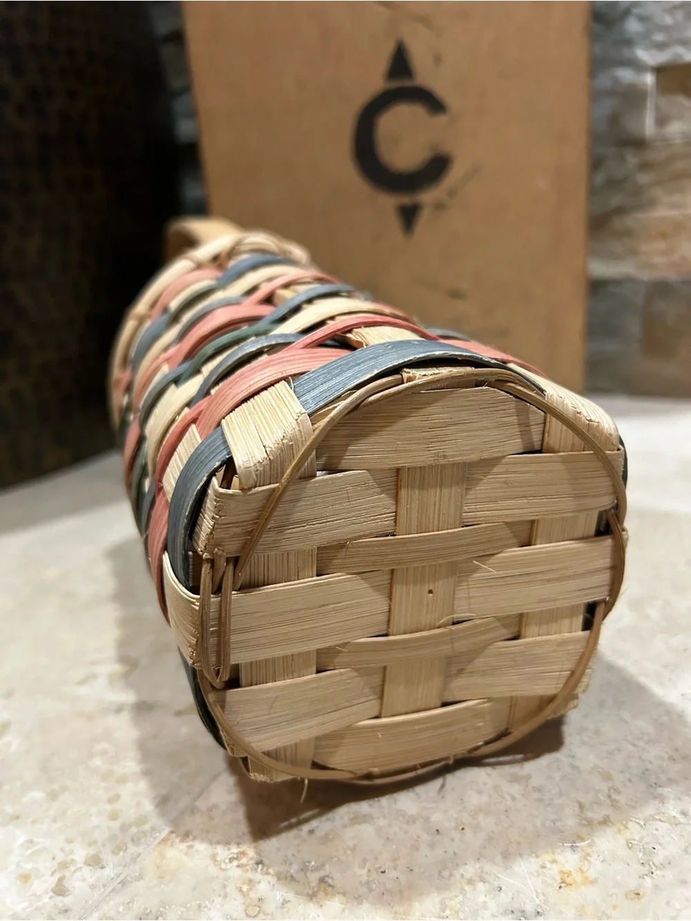 Vintage single-handled woven splint wood wine basket